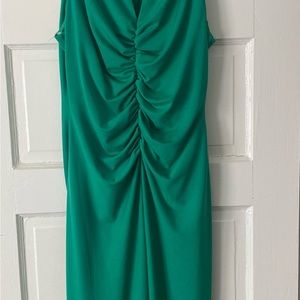Premier Amour: size 14. Sexy green body con lined stretch dress.